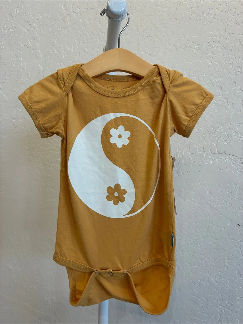 Mustard Yellow Yin Yang Flower Baby Bodysuit